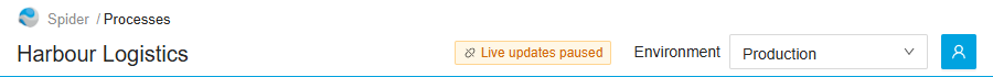 The header, with the orange tag Live updates paused next to the Environment selector